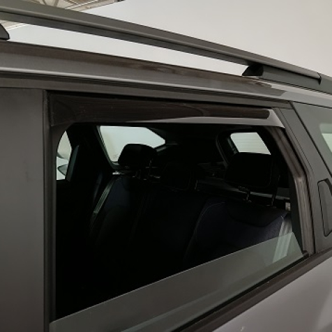 Wind deflectors for front and rear doors